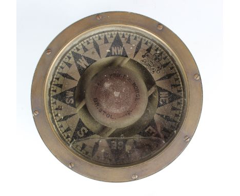 A brass cased gimbal mounted 9¼-inch ship's compass, the dial inscribed 'Price &amp; Morse Bristol' (some faults).Buyer’s Pre
