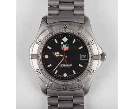 A Tag Heuer Professional 200 Metres steel cased gentleman's bracelet wristwatch with quartz movement, the signed black dial w