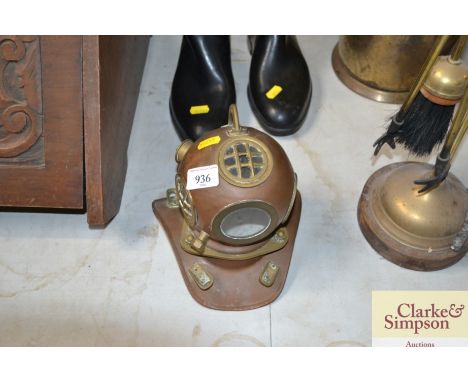 A miniature diving helmet