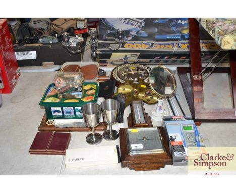 A quantity of various sundry items to include an oak cased barometer; shaving mirror; wall clock etc