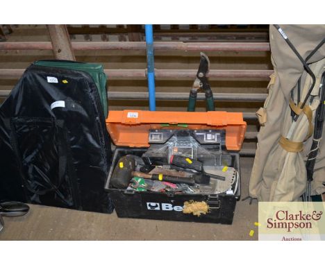 A toolbox and contents of various hand tools