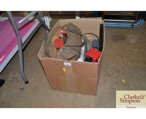 A box of various hand tools