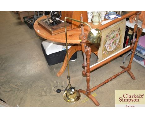 A floor standing adjustable reading lamp