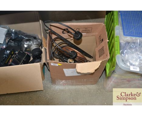 A box containing a candleholder, wall rack, candlestick etc.