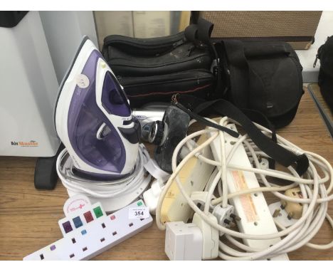 A PHILIPS CORDLESS IRON IN WORKING ORDER, AN OLYMPUS TRIP CAMERA, A VIDEO CAMERA AND VARIOUS EXTENSION LEADS 