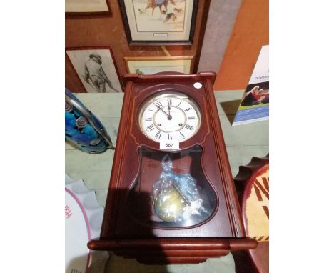 A MODERN 'WIDDUP' CHIMING MANTLE CLOCK WITH PENDULUM AND KEY 