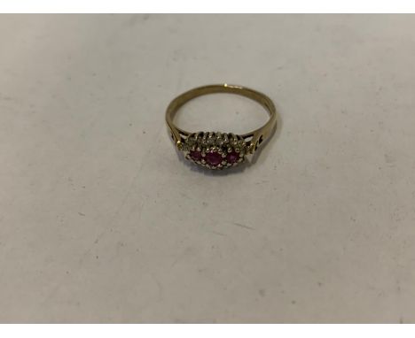 A 9CT GOLD DIAMOND AND RUBY RING, UK SIZE Q 