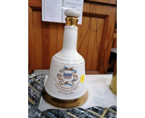 A 40 PROOF WHISKY DECANTER AND CONTENTS, NOT SEALED 