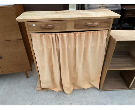 AN OAK KITCHEN UNIT WITH TWO SHORT DRAWERS AND FOUR SHELVES AND A FOUR SHELF PIGEON HOLE 