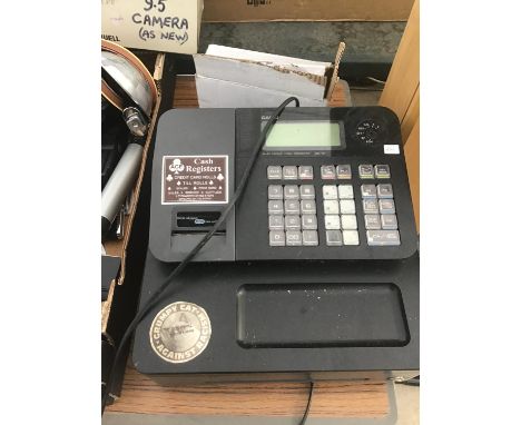 A CASIO SE 21 ELECTRONIC CASH REGISTER WITH SPARE ROLLS 