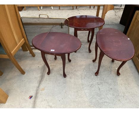 A BRASS FIREGUARD AND THREE MAHOGANY OCCASIONAL TABLES 