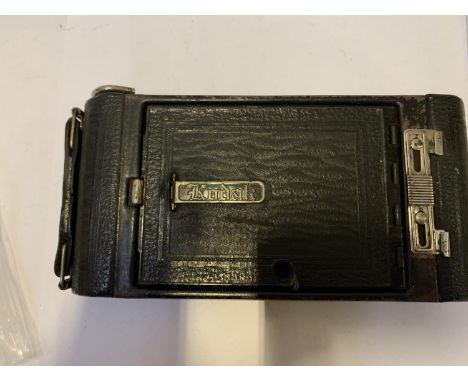 A VINTAGE KODAK FOLD UP CAMERA 