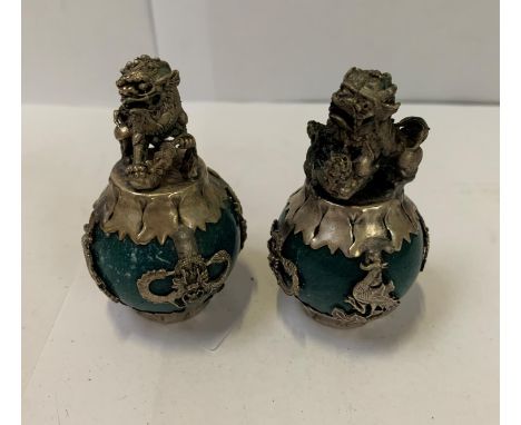 A PAIR OF ORIENTAL WHITE METAL AND JADE STYLE FU-DOGS 