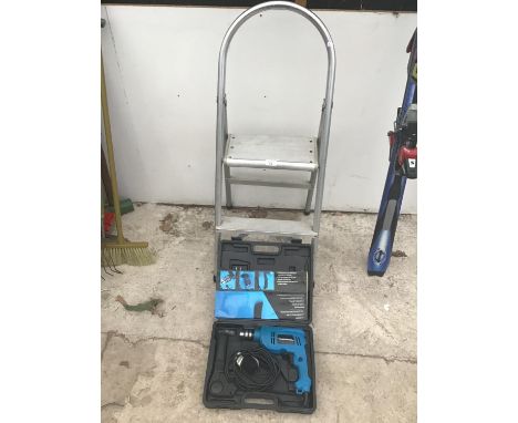 A CASED POWERBASE DRILL IN WORKING ORDER AND A PAIR OF TWO RUNG ALUMINIUM STEP LADDERS 