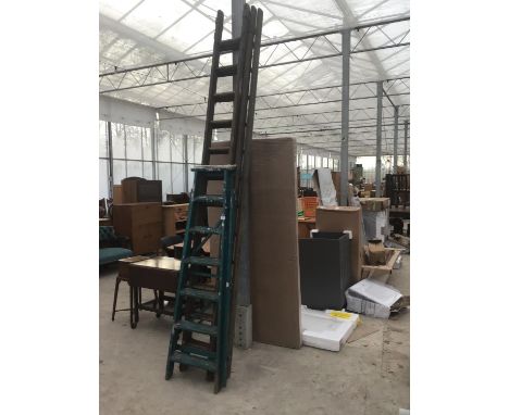 A VINTAGE SIX RUNG STEP LADDER AND A THIRTY SIX RUNG THREE SECTION LADDER 
