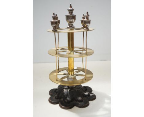 Brass bobbin rack on cast iron base 