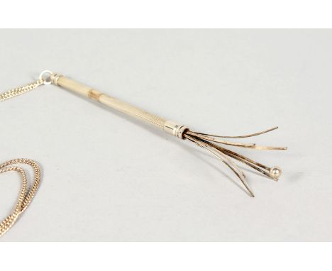 A MAPPIN &amp; WEBB SILVER SWIZZLE STICK on a chain in a Mappin &amp; Webb box.