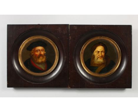 A PAIR OF CONTINENTAL PORTRAIT BUSTS BEARDED GENTLEMEN, oil on board, circular, in ebony frames. 3ins diameter.