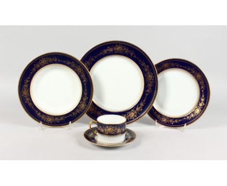 A COMPREHENSIVE LIMOGES PORCELAIN DINNER SERVICE, white ground with gilt decorated border, comprising: twenty three Dinner Pl