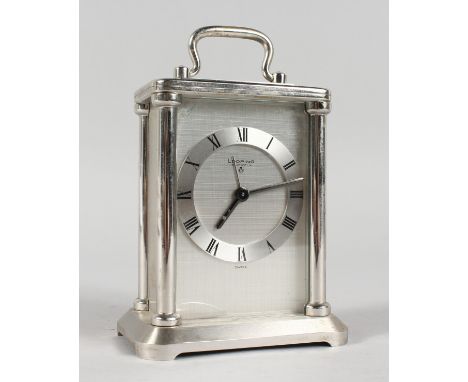 A LOOPING CHROME CARRIAGE CLOCK, with fifteen jewels, Swiss made, No. 1078574, with carrying handle. 5ins high.