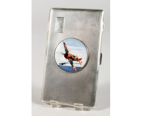 A LARGE ENGINE TURNED SILVER CIGARETTE CASE with a circular enamel plaque of a Spitfire. Birmingham 1942.