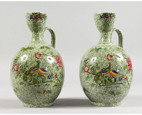 TWO COPELAND SPODE BOTTLE VASES, green leaf decorated ground with exotic birds (AF). 8.5ins high.
