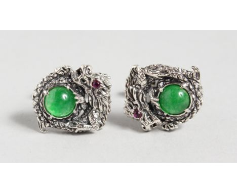 A PAIR OF SILVER AND JADE DRAGON CUFFLINKS.