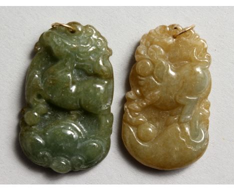 TWO SMALL CHINESE CARVED JADE PENDANTS. 1.5ins high,