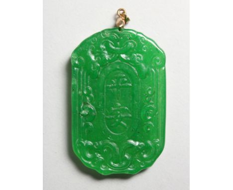 A CHINESE CARVED APPLE GREEN JADE PENDANT. 2.25ins high.