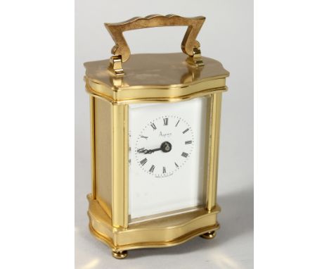 A VERY GOOD SMALL ASPREY FRENCH SERPENTINE SHAPED CARRIAGE CLOCK, made in England, battery operated. 3.5ins high.