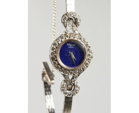 A LADIES' CHOPARD 18CT WHITE GOLD DINNER SET COCKTAIL WATCH with blue face, No. 4093116 813.