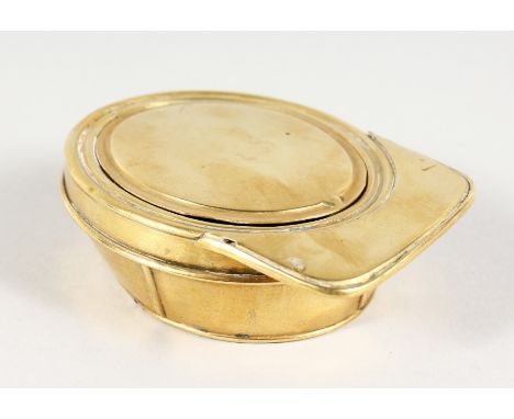 A BRASS JOCKEY CAP SNUFF BOX. 3.5ins long.