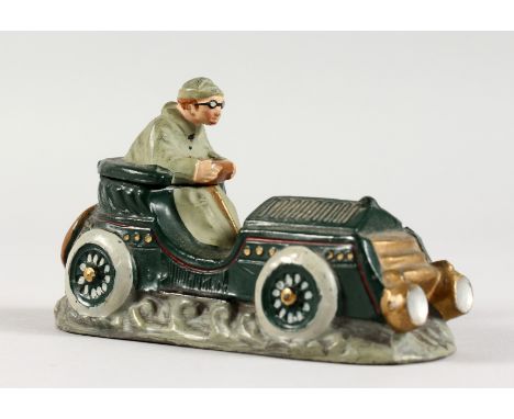 A RARE SPELTER MOTORING INKWELL, CIRCA 1910. 5ins long.