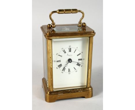 A GOOD ASPREY'S CARRIAGE CLOCK, seven jewelled movement, signed Bernard Freres, with carrying handle. 5ins high.