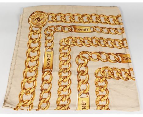 A VINTAGE CHANEL SILK SCARF, GOLD CHAIN.