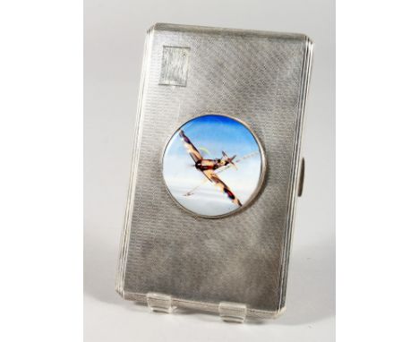 A LARGE ENGINE TURNED SILVER CIGARETTE CASE with a circular enamel plaque of a Spitfire. Birmingham 1921.