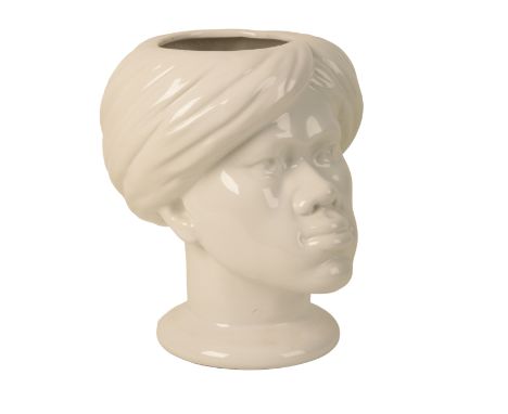 A PIERO FORNASETTI CERAMIC VASE  "Testa di moro". in the form of a head, stamped to the underside, 30cm high 