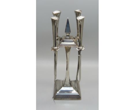 A silver Art Deco manicure stand, Birmingham 1935, with four tools 