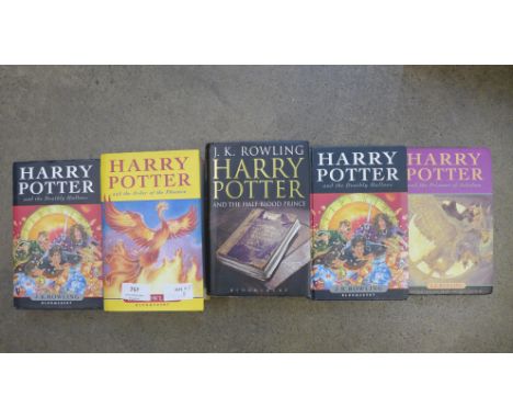 Four Harry Potter first edition books and an early edition of the Prisoner of Azkaban 