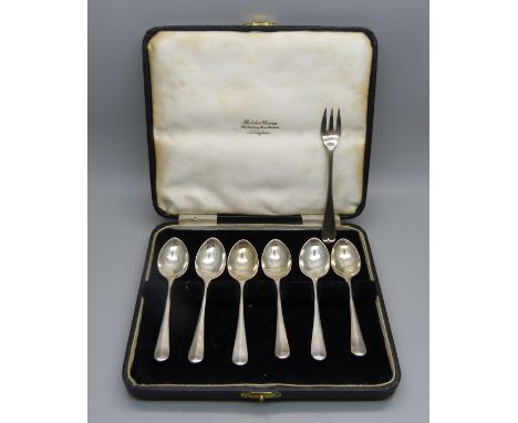 A set of six silver coffee spoons and a small silver fork, 55g 