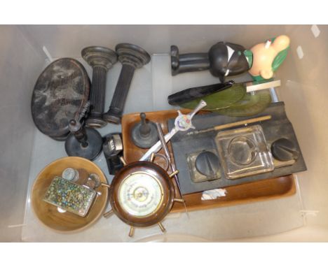 An ebony desk set, small barometer, Andy Capp bubble bath container, etc. 