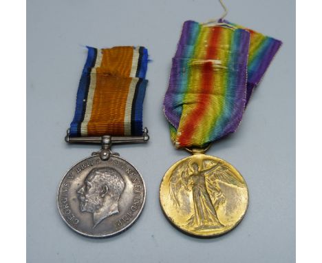 A pair of WWI medals, K.43520 P J. Smith Sto. 1 RN 