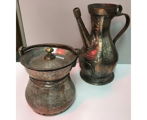 Two Turkish copper jugs both with scroll handles, tallest jug 31.5 cm high together with a Turkish copper pot and lid, 19 cm 