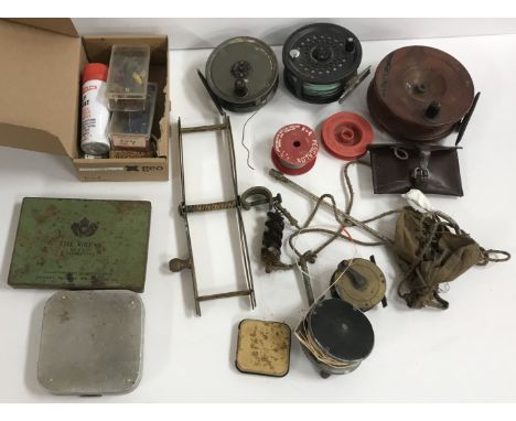 A box of various fishing requisites / piscatoriana including a BFR Magnum 200D disc drag reel, a JW Young & Sons Pridex reel,