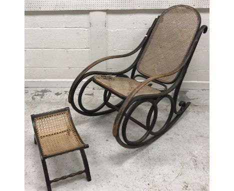 A circa 1900 bentwood and caned rocking armchair in the manner of Michel Thonet, approx 56.5 cm wide x 104 cm deep x 97 cm hi