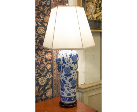 LAMP, vase shaped, blue and white Chinese style foliate decoration with wood base and shade, 78cm H. (wired)