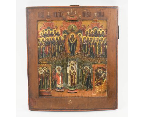 RUSSIAN ICON, portraying a convocation of saintly figures, painted on wooden panel, 44cm H x 39cm W.