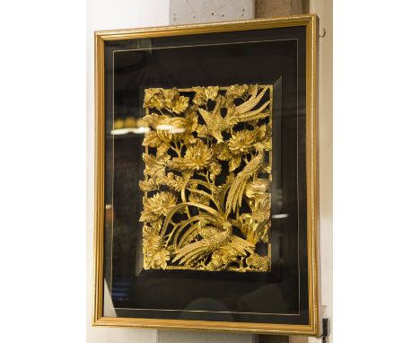 CHINESE CARVED PANEL, pierced and gilt with carved leaf and exotic bird decoration in a rectangular glazed gilt coloured fram