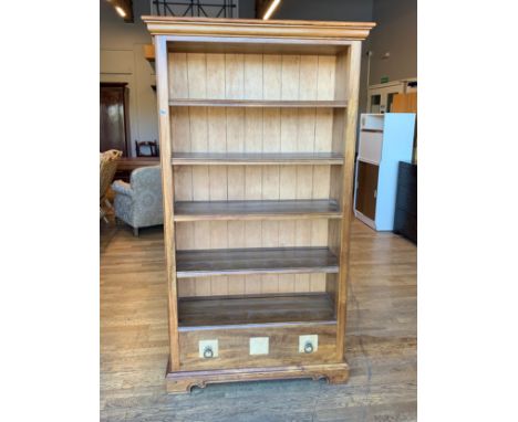 Two oak five shelf freestanding bookcase, one drawer, with tile effect decoration, brass ring pull handles, 101cm x 182cm x 4