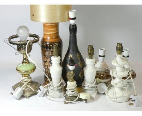 A collection of table lamps, to include an Art Deco style chrome column standard lamp with matching table lamp with shades. 